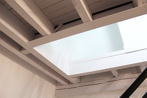 como hacer un refuerzo de una viga de madera en una casa