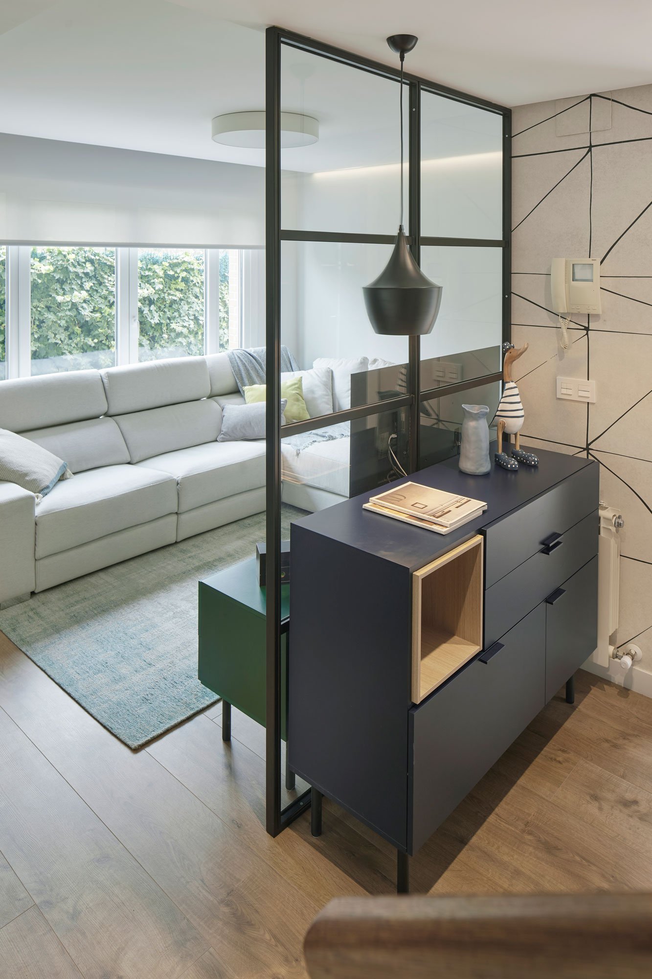 Mampara separadora de ambientes en acero y vidrio